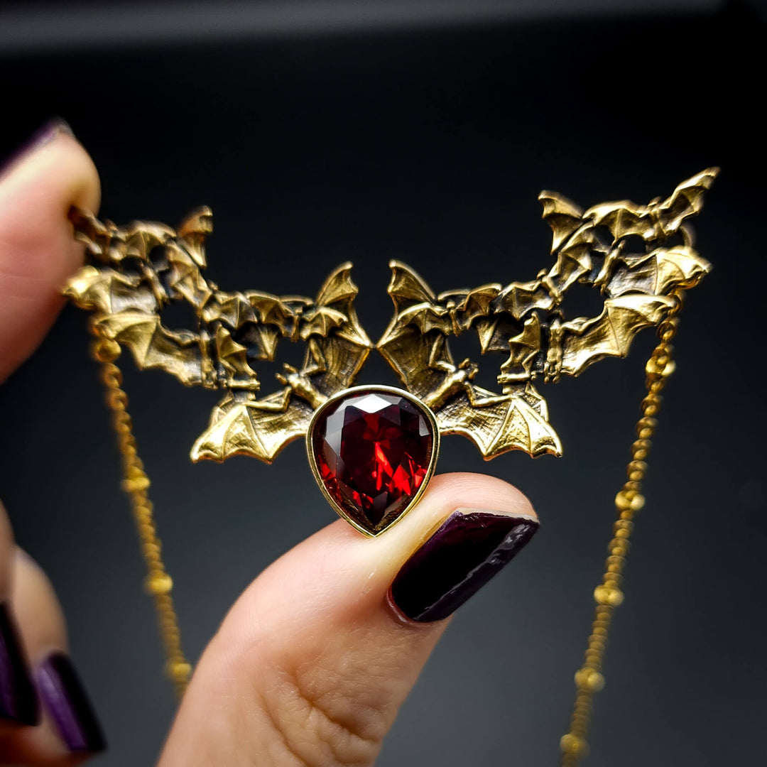 Brass Garnet Bat Swarm Necklace
