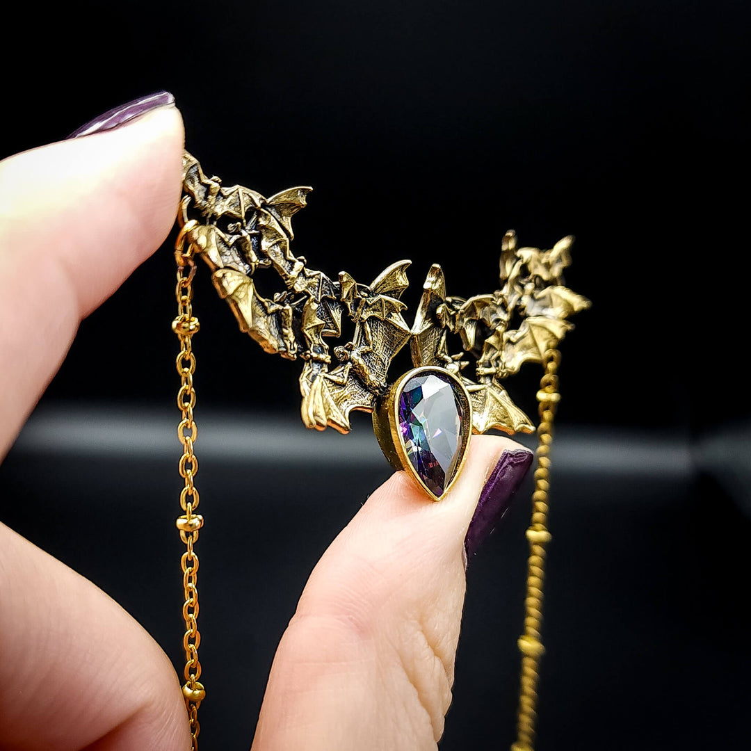 Brass Mystic Topaz Bat Swarm Necklace