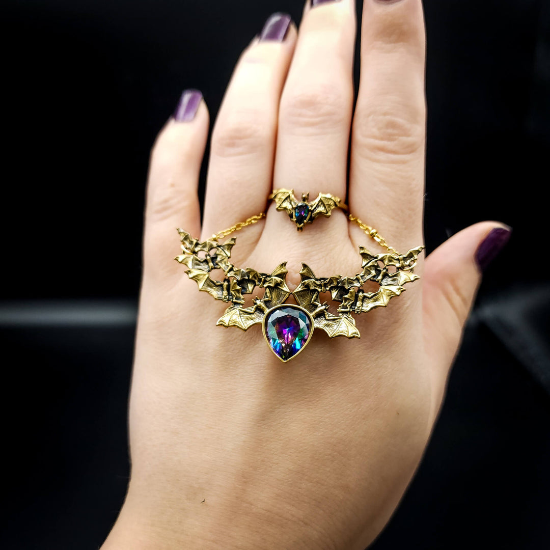 Brass Mystic Topaz Bat Swarm Necklace