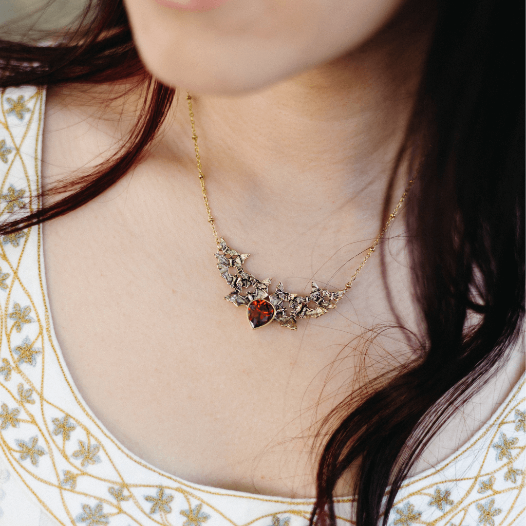 Brass Onyx Bat Swarm Necklace