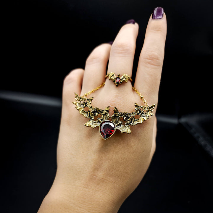 Brass Garnet Bat Ring