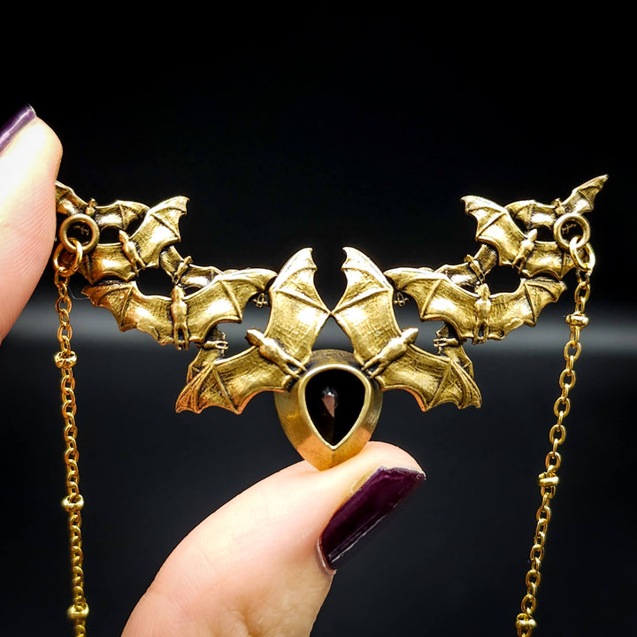 Brass Onyx Bat Swarm Necklace