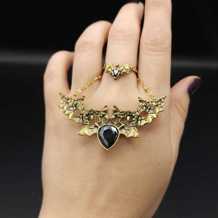 Brass Onyx Bat Swarm Necklace