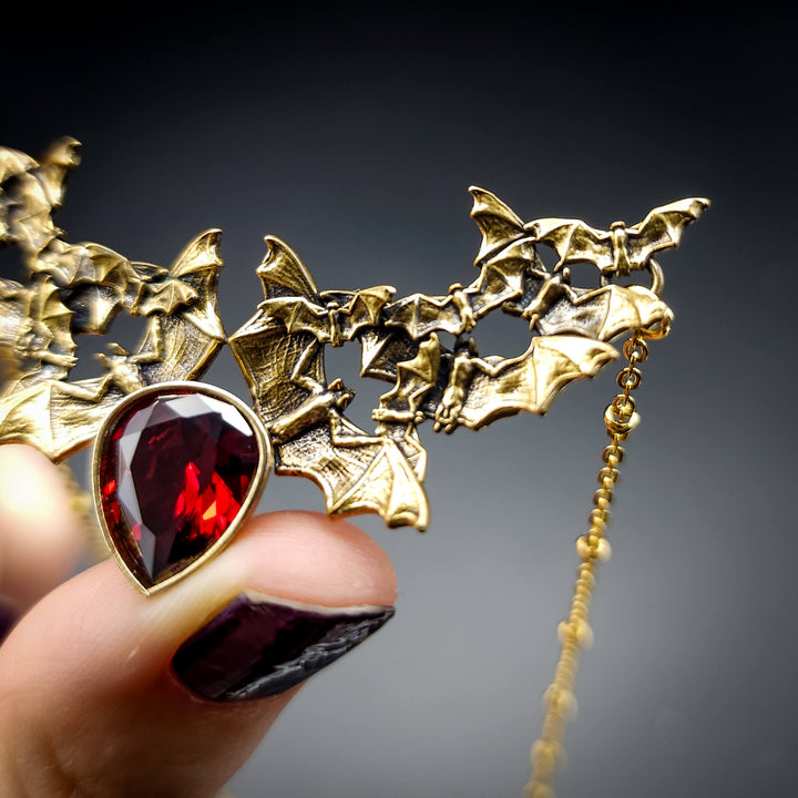 Brass Garnet Bat Swarm Necklace