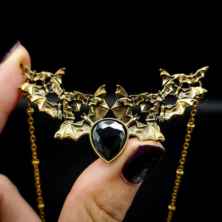 Brass Onyx Bat Swarm Necklace