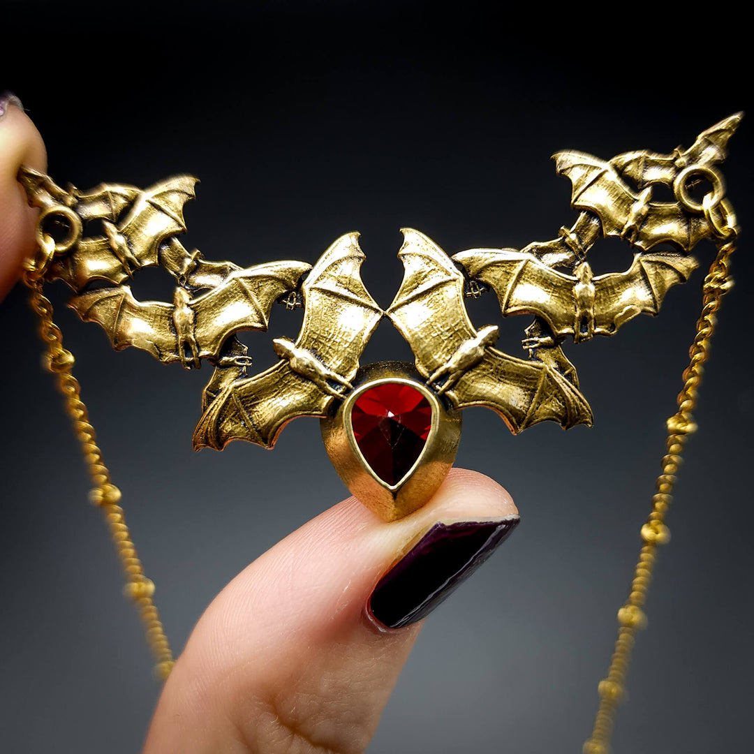 Brass Garnet Bat Swarm Necklace